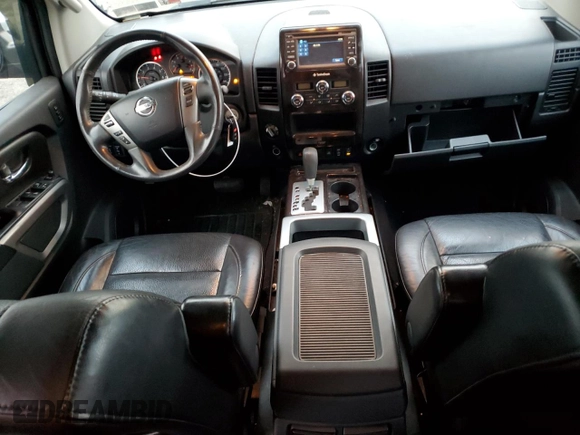 2015 Nissan Titan Pro-4X with VIN 1N6AA0EC2FN501632, listed as a Copart auction lot 84063524 with 92,342 mi miles and Salvage title. Bid and sale history available at DreamBid. Image 8.