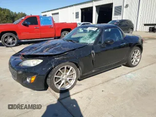 2010 Mazda MX-5 Miata Grand Touring with VIN JM1NC2FFXA0206089, listed as a Copart auction lot 76752674 with 212,584 mi miles and Salvage title. Bid and sale history available at DreamBid. Image 1.