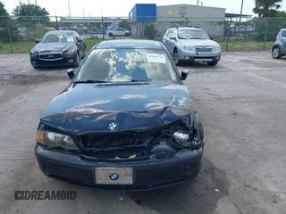 2002 BMW 3 Series 325i with VIN WBAET37412NG78995, listed as a IAAI auction lot 41965274 with 131,138 mi miles. Bid and sale history available at carsss.com. Image 6.