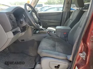 2007 Jeep Commander Sport with VIN 1J8HG48K07C684965, listed as a Copart auction lot 58061005 with 208,951 mi miles and Salvage title. Bid and sale history available at DreamBid. Image 7.