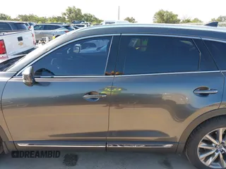 2020 Mazda CX-9 Grand Touring with VIN JM3TCADY1L0417651, listed as a IAAI auction lot 42334867 with 105,236 mi miles and . Bid and sale history available at DreamBid. Image 14.