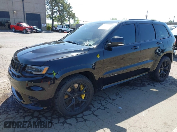 2020 Jeep Grand Cherokee Trackhawk with VIN 1C4RJFN96LC336561, listed as a IAAI auction lot 41991800 with 58,781 mi miles and . Bid and sale history available at DreamBid. Image 2.