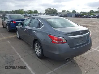 2014 Nissan Altima S with VIN 1N4AL3AP5EC404061, listed as a IAAI auction lot 41965252 with 121,049 mi miles and . Bid and sale history available at carsss.com. Image 3.