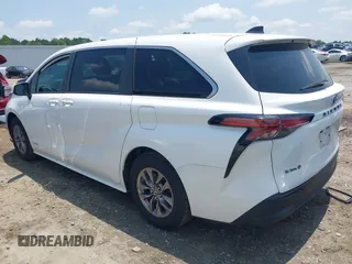 2021 Toyota Sienna LE with VIN 5TDKRKEC6MS029020, listed as a IAAI auction lot 42381285 with 103,260 mi miles and . Bid and sale history available at DreamBid. Image 3.