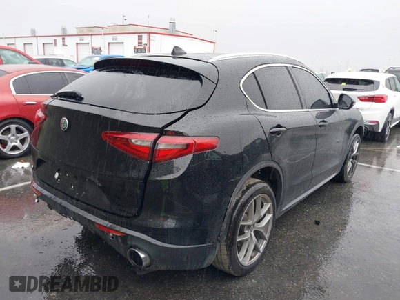 2018 Alfa Romeo Stelvio z VIN ZASFAKANXJ7C23921, wystawiony jako IAAI lot #38783836 z przebiegiem 93 482 mil mil oraz . Historia ofert i sprzedaży dostępna na DreamBid. Obrazek 4.