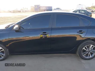 2023 Kia Forte LXS with VIN 3KPF24AD7PE680915, listed as a IAAI auction lot 40741003 with 16,770 mi miles and . Bid and sale history available at DreamBid. Image 14.