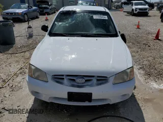 2002 Hyundai Accent GL with VIN KMHCG35C82U230535, listed as a Copart auction lot 77709454 with 116,200 mi miles and Non Repairable. Bid and sale history available at carsss.com. Image 5.