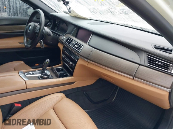 2015 BMW 7 Series 750Li xDrive with VIN WBAYF8C5XFD655174, listed as a IAAI auction lot 41480525 with 79,238 mi miles and . Bid and sale history available at carsss.com. Image 5.