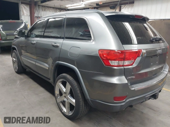 2013 Jeep Grand Cherokee Limited with VIN 1C4RJEBT9DC547491, listed as a IAAI auction lot 41969275 with 161,600 mi miles. Bid and sale history available at carsss.com. Image 3.