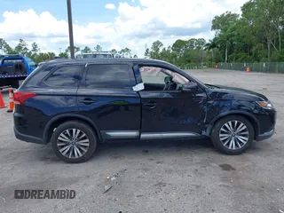 2019 Mitsubishi Outlander ES with VIN JA4AZ3A36KZ049555, listed as a IAAI auction lot 42567525 with 170,346 mi miles and . Bid and sale history available at DreamBid. Image 13.