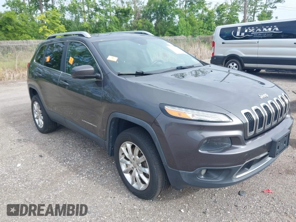 2014 Jeep Cherokee Limited z VIN 1C4PJMDSXEW294199, wystawiony jako IAAI lot #42466782 z przebiegiem 137 783 mil mil oraz . Historia ofert i sprzedaży dostępna na DreamBid. Obrazek 1.