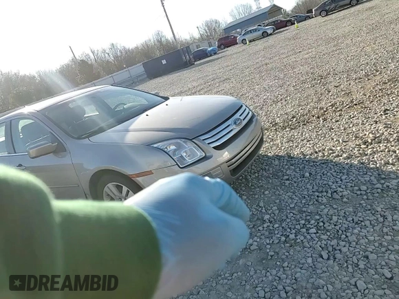 2008 Ford Fusion SEL with VIN 3FAHP08128R112781, listed as a Copart auction lot 48602325 with 142,174 mi miles and Salvage Title. Bid and sale history available at carsss.com. Image 11.