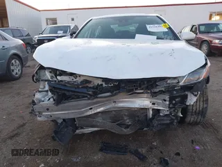 2019 Toyota Camry LE z VIN 4T1B11HK1KU804266, wystawiony jako IAAI lot #41226403 z przebiegiem 91 163 mil mil oraz . Historia ofert i sprzedaży dostępna na DreamBid. Obrazek 6.