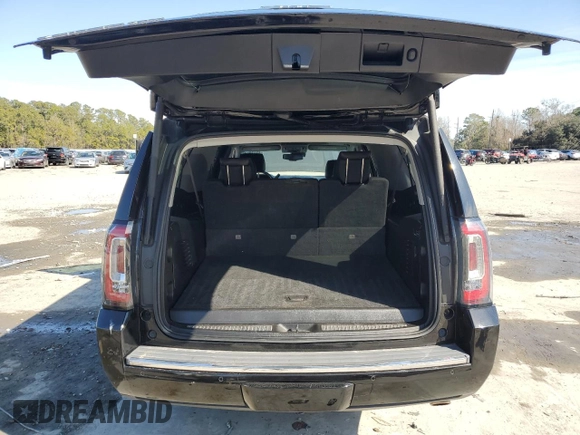 2019 GMC Yukon XL Denali with VIN 1GKS2HKJ9KR264134, listed as a Copart auction lot 43138545 with 105,690 mi miles and Salvage Title. Bid and sale history available at DreamBid. Image 6.