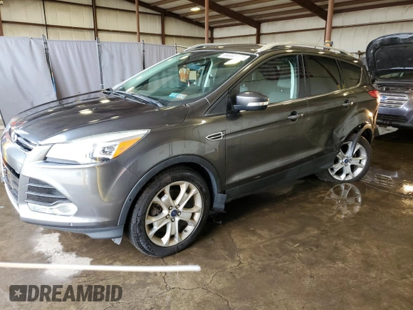 2016 Ford Escape Titanium with VIN 1FMCU9J92GUA89930, listed as a Copart auction lot 64441475 with 80,713 mi miles and Salvage title. Bid and sale history available at DreamBid. Image 1.