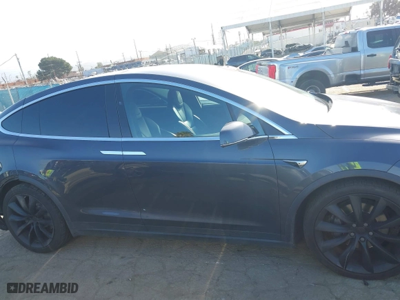 2018 Tesla Model X 75D with VIN 5YJXCBE22JF124270, listed as a IAAI auction lot 41909734 with 92,553 mi miles. Bid and sale history available at carsss.com. Image 13.