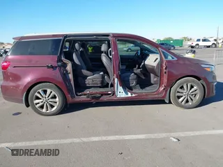 2015 Kia Sedona SX-L with VIN KNDME5C15F6046322, listed as a IAAI auction lot 41301459 with 76,026 mi miles and . Bid and sale history available at DreamBid. Image 6.
