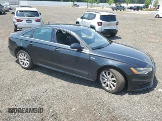 2015 Audi A6 Prestige with VIN WAUHGAFC1FN007148, listed as a Copart auction lot 61080435 with 123,739 mi miles and Salvage title. Bid and sale history available at DreamBid. Image 4.