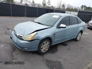 2008 Ford Focus SE with VIN 1FAHP35N78W270569, listed as a IAAI auction lot 38518647 with 173,674 mi miles. Bid and sale history available at carsss.com. Image 2.