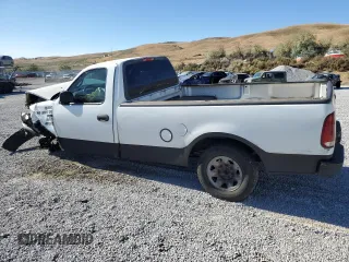 2000 Ford F-150 XL with VIN 2FTPF17Z5YCA99717, listed as a Copart auction lot 70658194 with Not provided miles and Salvage title. Bid and sale history available at DreamBid. Image 2.