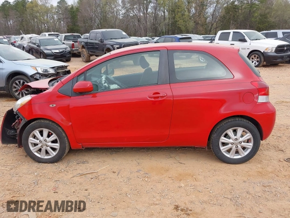 2009 Toyota Yaris with VIN JTDJT903595243068, listed as a IAAI auction lot 41899358 with 310,199 mi miles. Bid and sale history available at carsss.com. Image 14.
