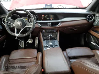 2019 Alfa Romeo Stelvio Ti z VIN ZASPAKBN2K7C35002, wystawiony jako Copart lot #55448965 z przebiegiem 109 812 mil mil oraz Tytuł czysty. Historia ofert i sprzedaży dostępna na DreamBid. Obrazek 8.