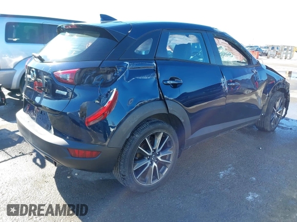 2017 Mazda CX-3 Touring with VIN JM1DKFC75H0157610, listed as a IAAI auction lot 41326591 with 51,291 mi miles. Bid and sale history available at carsss.com. Image 4.