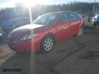 2007 Toyota Camry CE with VIN 4T1BE46K67U010279, listed as a IAAI auction lot 41504065 with 297,916 mi miles. Bid and sale history available at carsss.com. Image 2.