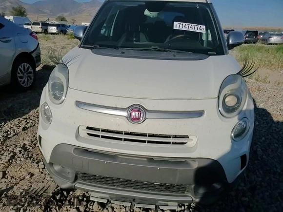 2014 FIAT 500L Trekking with VIN ZFBCFADH6EZ011642, listed as a Copart auction lot 71474774 with 104,327 mi miles and Salvage Title. Bid and sale history available at carsss.com. Image 11.