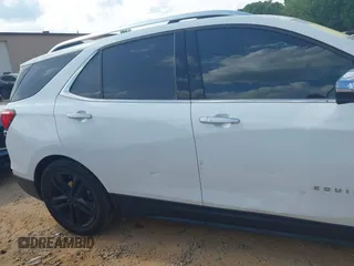 2019 Chevrolet Equinox Premier z VIN 2GNAXPEX9K6177386, wystawiony jako IAAI lot #42172103 z przebiegiem 61 045 mil mil oraz . Historia ofert i sprzedaży dostępna na DreamBid. Obrazek 18.