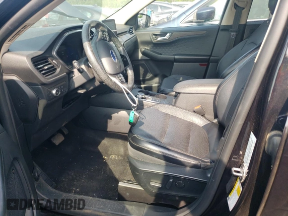 2020 Ford Escape Titanium z VIN 1FMCU9J97LUB25055, wystawiony jako Copart lot #60326945 z przebiegiem 78 711 mil mil oraz Szkoda całkowita • Salvage title. Historia ofert i sprzedaży dostępna na DreamBid. Obrazek 7.