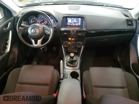 2014 Mazda CX-5 Sport с VIN JM3KE2BE0E0367493, выставлен на аукционе Copart как лот 57324195 с пробегом 103 367 миль миль и Списание • Salvage title. История ставок и продаж доступна на DreamBid. Изображение 8.