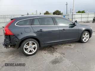 2015 Volvo V60 with VIN YV1612SB5F1186312, listed as a Copart auction lot 58552405 with 77,610 mi miles and Salvage title. Bid and sale history available at DreamBid. Image 3.