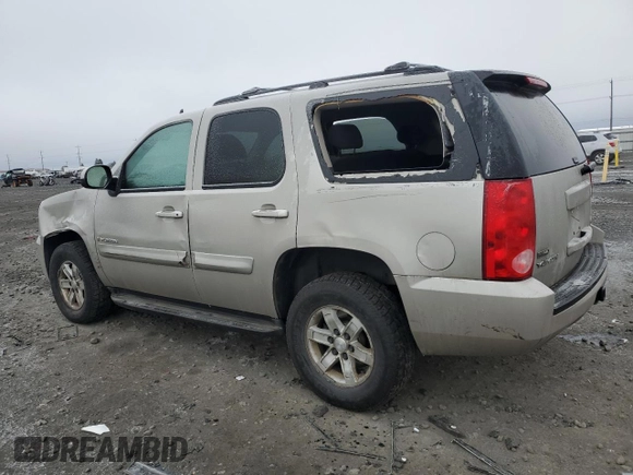 2009 GMC Yukon SLE w/3SB with VIN 1GKFK23039R224372, listed as a Copart auction lot 87762195 with 160,893 mi miles and Salvage Title. Bid and sale history available at carsss.com. Image 2.