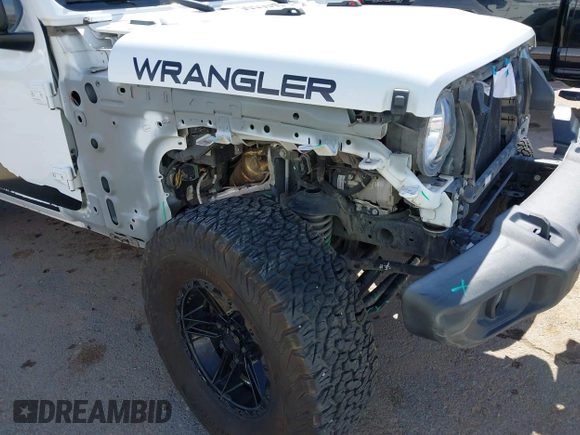 2020 Jeep Wrangler Unlimited Sport with VIN 1C4HJXDG0LW174393, listed as a IAAI auction lot 41575040 with 68,418 mi miles and . Bid and sale history available at DreamBid. Image 20.