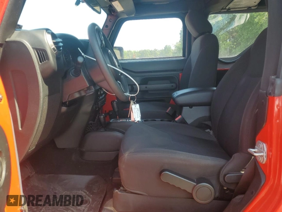 2018 Jeep Wrangler Willys Wheeler W with VIN 1C4AJWAG8JL897178, listed as a Copart auction lot 62576405 with 12,381 mi miles and Salvage title. Bid and sale history available at DreamBid. Image 7.