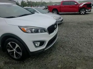 2016 Kia Sorento EX with VIN 5XYPH4A52GG125241, listed as a Copart auction lot 55995805 with 128,788 mi miles and Salvage title. Bid and sale history available at DreamBid. Image 14.