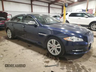 2014 Jaguar XJ Portfolio with VIN SAJWJ2GD7E8V67473, listed as a Copart auction lot 43968705 with 99,146 mi miles and Salvage title. Bid and sale history available at DreamBid. Image 4.