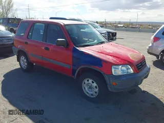 1999 Honda CR-V LX with VIN JHLRD2847XC009921, listed as a IAAI auction lot 41795325 with 268,638 mi miles. Bid and sale history available at carsss.com. Image 1.