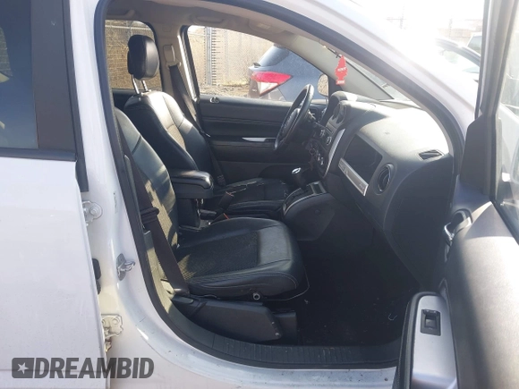 2014 Jeep Compass Latitude with VIN 1C4NJDEB8ED622012, listed as a IAAI auction lot 41917126 with 143,065 mi miles. Bid and sale history available at carsss.com. Image 5.