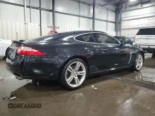 2007 Jaguar XK with VIN SAJWA43C479B18700, listed as a Copart auction lot 83377684 with 143,746 mi miles and Salvage Title. Bid and sale history available at carsss.com. Image 3.