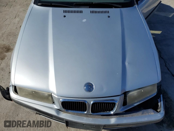 1997 BMW 3-Series 328IC with VIN WBABK8326VET99504, listed as a Copart auction lot 76481924 with 172,043 mi miles and Salvage Title. Bid and sale history available at carsss.com. Image 11.