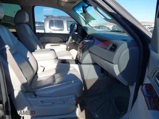 2012 Chevrolet Suburban LT with VIN 1GNSCJE09CR204947, listed as a IAAI auction lot 41501416 with 205,712 mi miles. Bid and sale history available at carsss.com. Image 5.