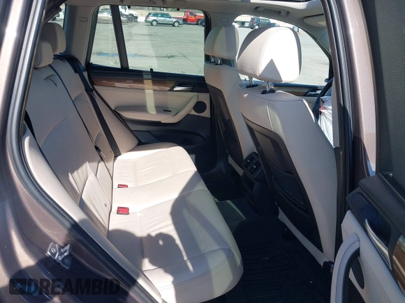 2012 BMW X3 28i with VIN 5UXWX5C53CL719786, listed as a IAAI auction lot 41857244 with 94,911 mi miles and . Bid and sale history available at DreamBid. Image 7.