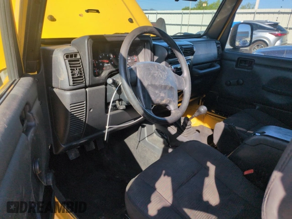 2004 Jeep Wrangler Sport z VIN 1J4FA49S64P751615, wystawiony jako Copart lot #55810895 z przebiegiem 128 165 mil mil oraz Szkoda całkowita • Salvage title. Historia ofert i sprzedaży dostępna na DreamBid. Obrazek 8.