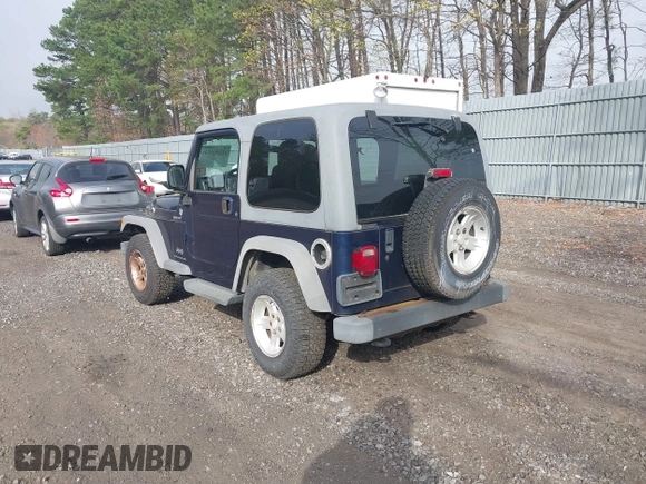2005 Jeep Wrangler Sport z VIN 1J4FA49S25P302627, wystawiony jako IAAI lot #42100601 z przebiegiem 169 650 mil mil oraz . Historia ofert i sprzedaży dostępna na DreamBid. Obrazek 3.
