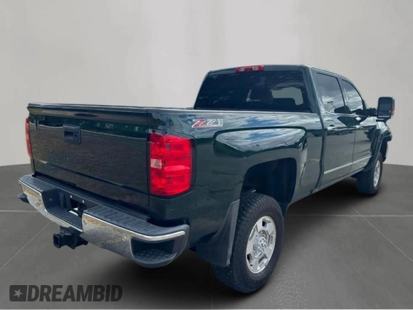 2015 GMC Sierra 2500HD available WiFi SLT with VIN 1GT12ZE82FF581685, listed as a Copart auction lot 54453955 with 185,110 mi miles and Clean Title. Bid and sale history available at carsss.com. Image 4.