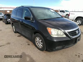 2009 Honda Odyssey EX-L with VIN 5FNRL38779B002859, listed as a IAAI auction lot 41815563 with 149,858 mi miles. Bid and sale history available at carsss.com. Image 1.