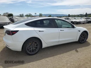 2023 Tesla Model 3 с VIN 5YJ3E1EA7PF452786, выставлен на аукционе Copart как лот 52570005 с пробегом 61 492 миль миль и Списание • Salvage title. История ставок и продаж доступна на DreamBid. Изображение 3.