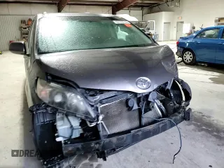 2011 Toyota Sienna SE with VIN 5TDXK3DCXBS159705, listed as a Copart auction lot 52173115 with 134,100 mi miles and Salvage Title. Bid and sale history available at carsss.com. Image 11.